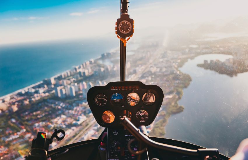 helicopter flying high with view over a city